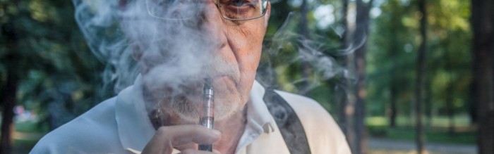 Man Using Electronic Nicotine Delivery System